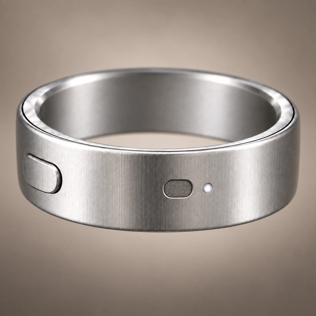 Interface ring in brushed silver, showing the button, microphone and recording light.